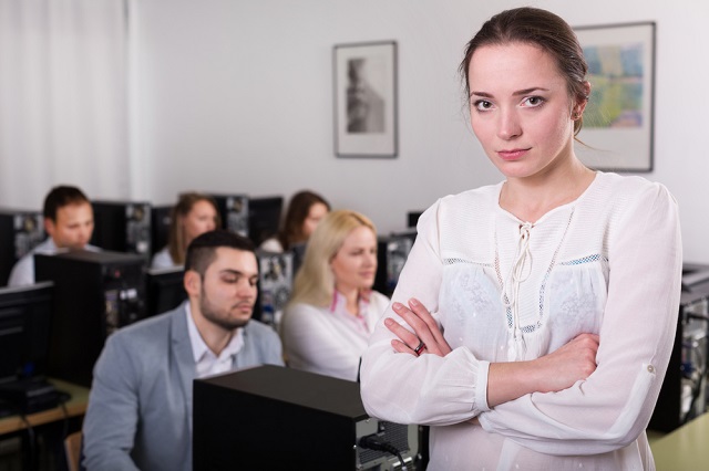 Corporate Uniform young teacher in class