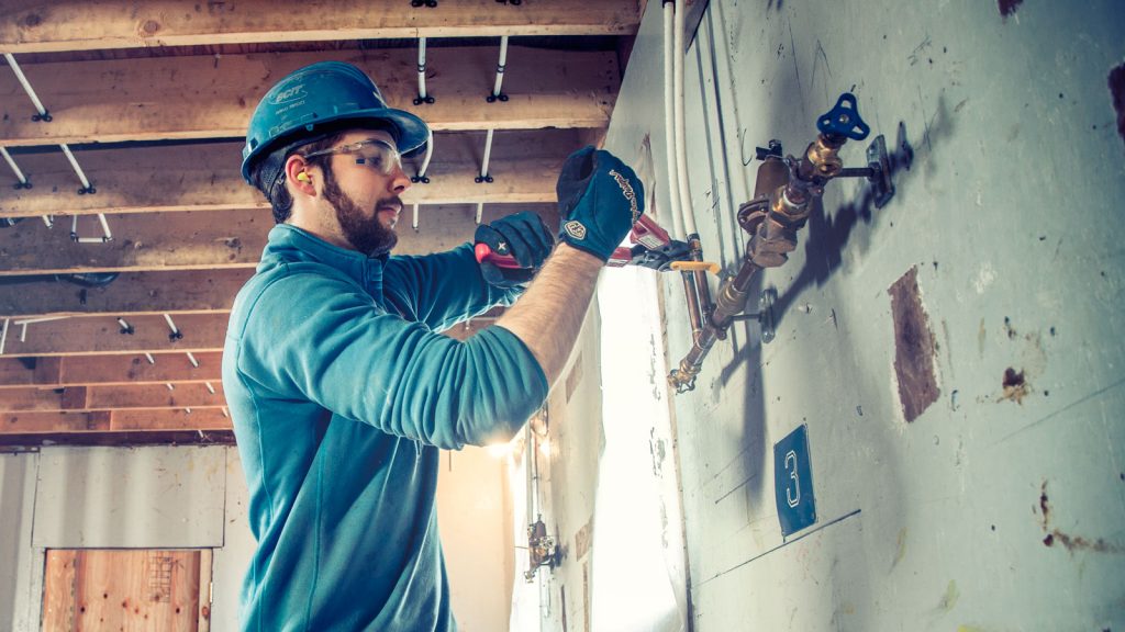 LXP - Plumber Working Plumb At Work